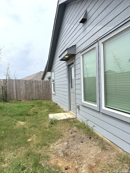 Exterior details and patio area of a home in Stone Garden, Elmendorf (Image 19).