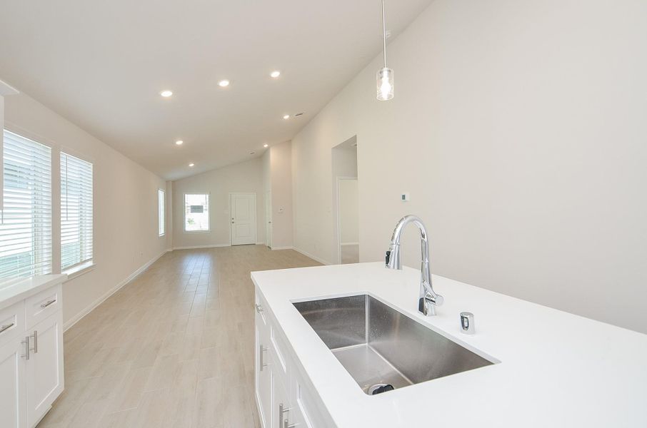 Notice the stainless steel, deep sink on the island. Notice the stainless steel, deep sink on the island.