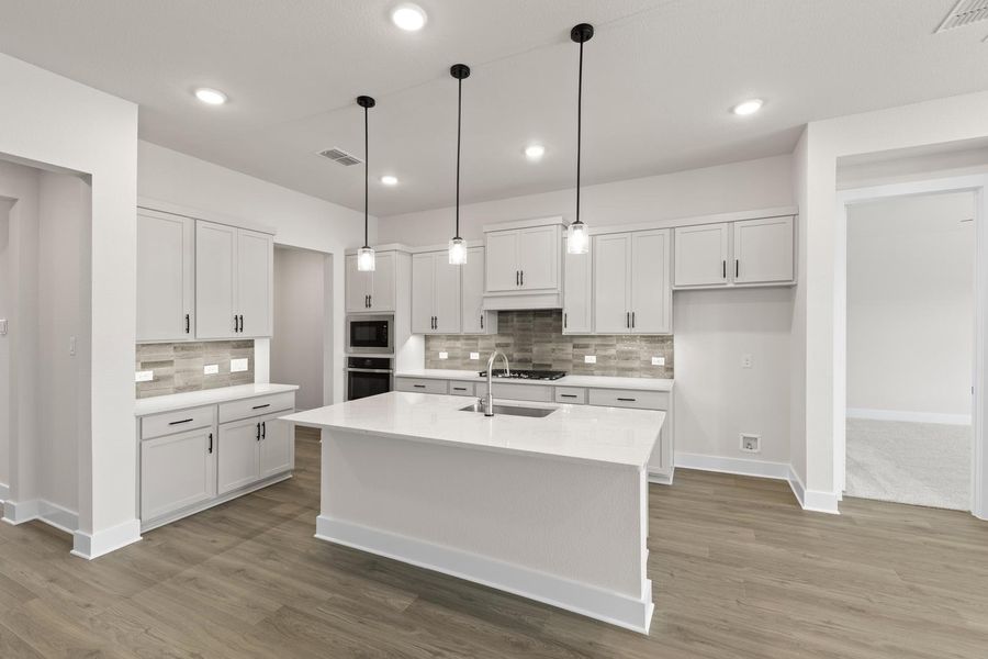 Furnished interior view inside a new home in Union Park, Little Elm (Image 10). Furnished interior view inside a new home in Union Park, Little Elm (Image 10).