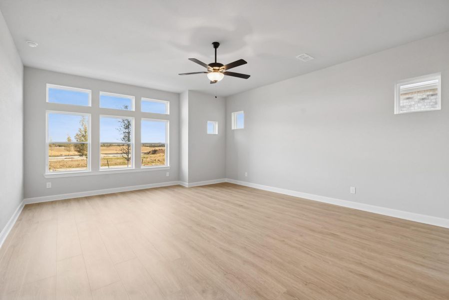 Spacious, unfurnished interior of a new home in Riceland 50’ Alley Load Homesites, Mont Belvieu (Image 19).