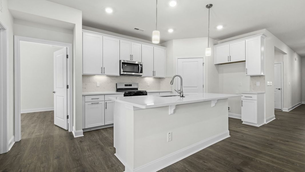Furnished interior view inside a new home in The Villas at Kinsley, Jamestown (Image 5).