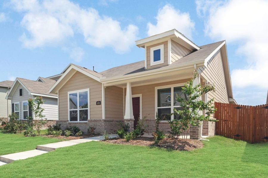 Representative exterior photo of a completed home built from the Bastrop by Impression Homes in Heartland, Heartland, TX (Image 2).