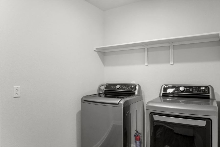 Laundry room featuring washer and dryer