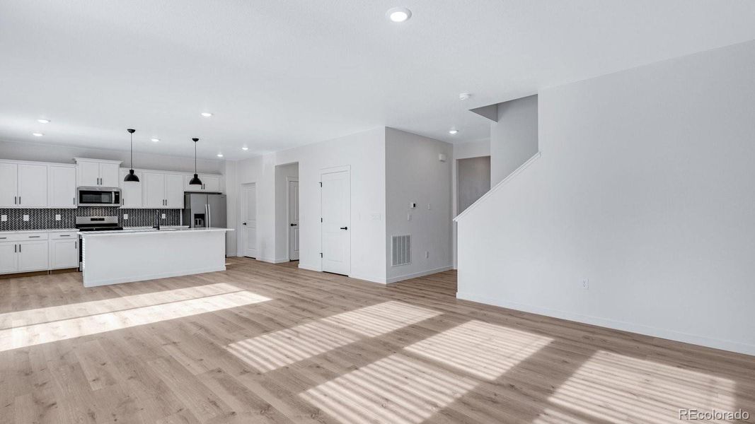 Spacious, unfurnished interior of a new home in Trails at Crowfoot, Parker (Image 22).