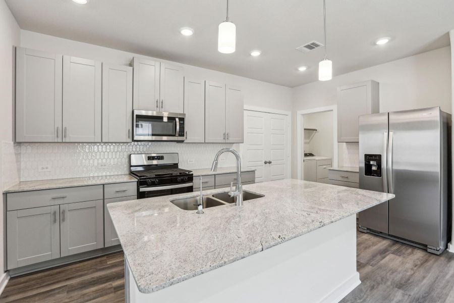 Photo is not of the actual home, but is an inspirational photo of builder’s model home and may depict options, furnishings, and/or decorator features that are not included