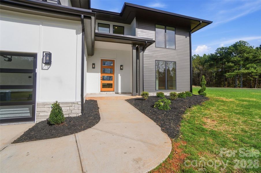 Exterior details and patio area of a home in , Mooresville (Image 3).