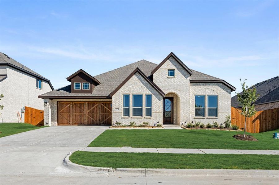 Front exterior of a new home in The Retreat at North Grove 60, Waxahachie, TX, highlighting curb appeal (Image 1). Front exterior of a new home in The Retreat at North Grove 60, Waxahachie, TX, highlighting curb appeal (Image 1).