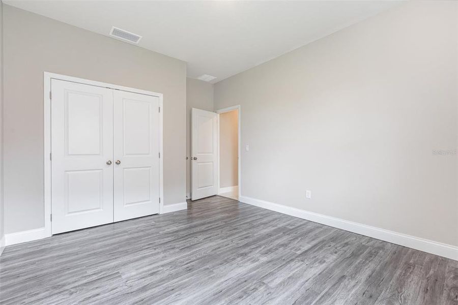 Spacious, unfurnished interior of a new home in , Port Charlotte (Image 17).