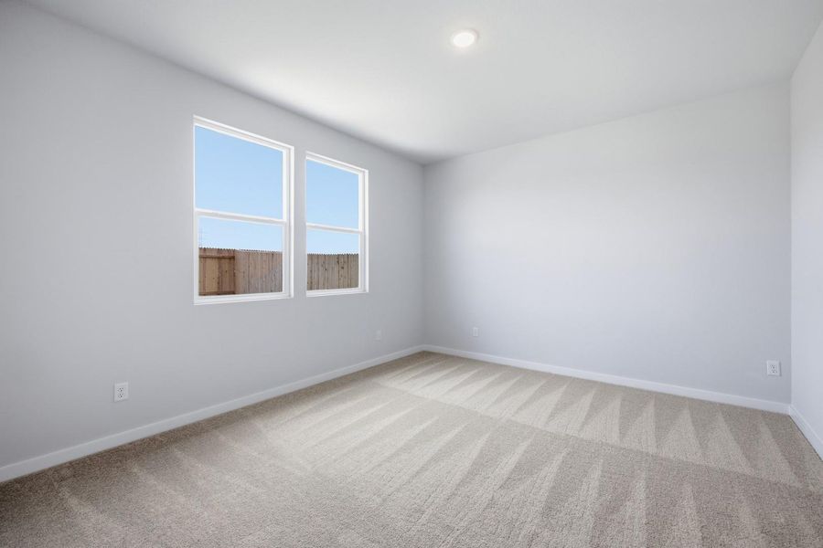 Spacious, unfurnished interior of a new home in Stallion Run, Buda (Image 37).