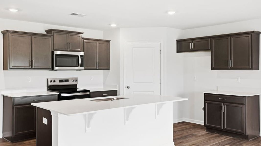 Furnished interior view inside a new home in Lakestone, Woodruff (Image 8).