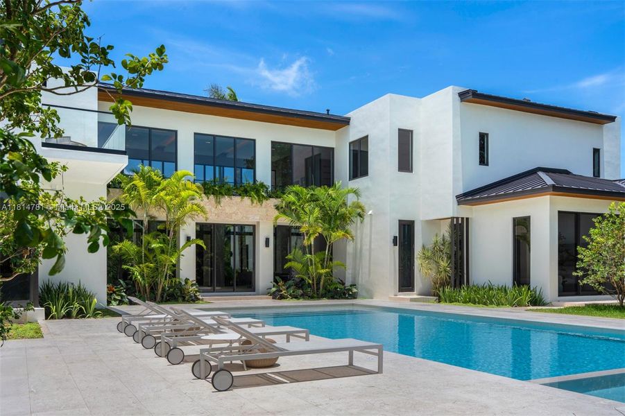 Front exterior of a new home in , Pinecrest, FL, highlighting curb appeal (Image 23).