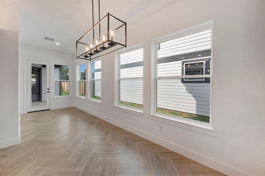 Spacious, unfurnished interior of a new home in Two Step Farm - Cottages Row Collection, Montgomery (Image 14).