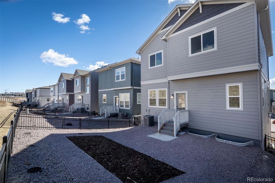 Exterior details and patio area of a home in Trailside at Cottonwood Creek, Colorado Springs (Image 3).