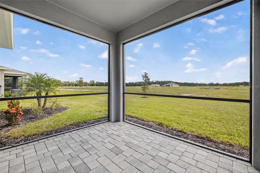 Exterior details and patio area of a home in Windwater, Parrish (Image 2).