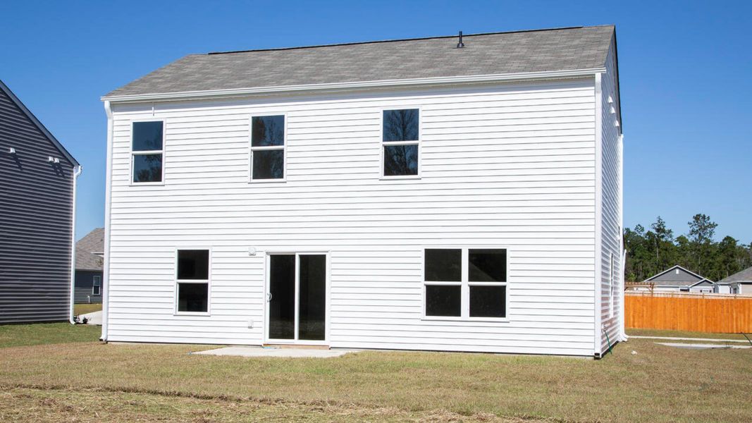 Representative exterior photo of a completed home built from the ARDEN by D.R. Horton in Eagle Creek, Bolivia, NC (Image 22).