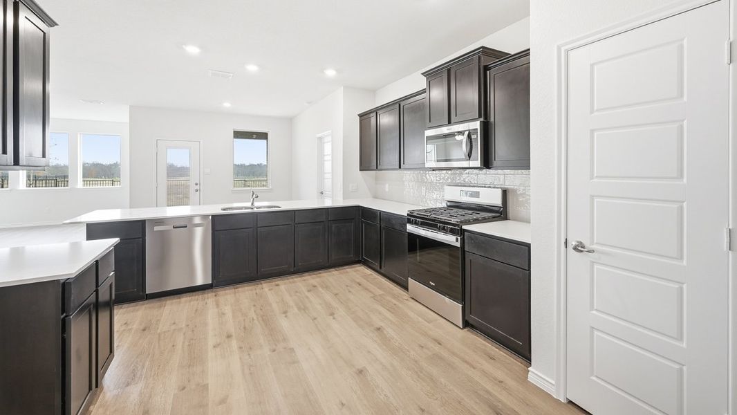 Furnished interior view inside a new home in Lilybrooke at Legacy Hills, Celina (Image 3).