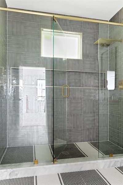 Bathroom featuring walk in shower