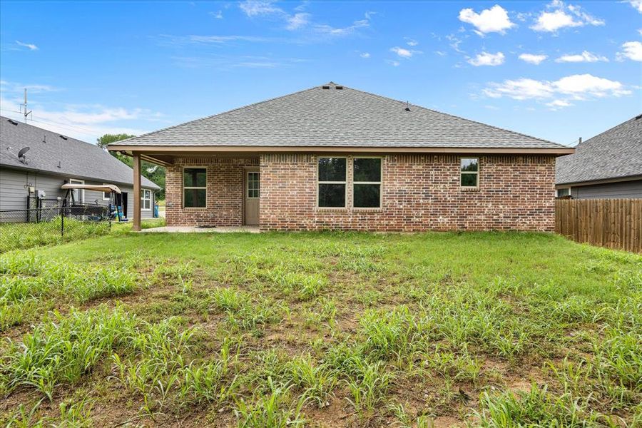 Front exterior of a new home in , Granbury, TX, highlighting curb appeal (Image 20). Front exterior of a new home in , Granbury, TX, highlighting curb appeal (Image 20).