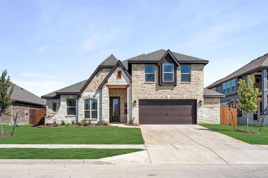 Front exterior of a new home in Maplewood, Glenn Heights, TX, highlighting curb appeal (Image 2). Front exterior of a new home in Maplewood, Glenn Heights, TX, highlighting curb appeal (Image 2).