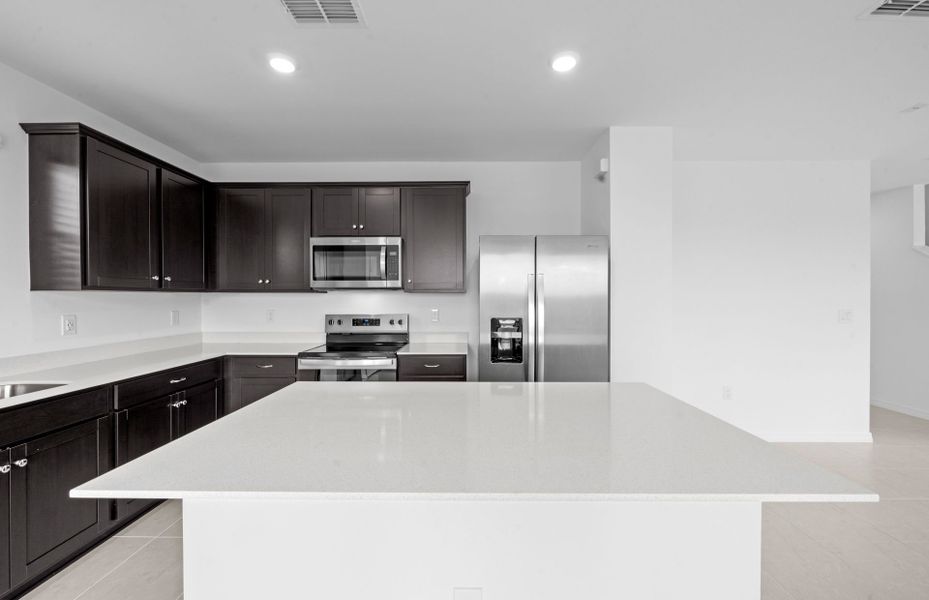 Furnished interior view inside a new home in Whispering Lakes, Lehigh Acres (Image 11).