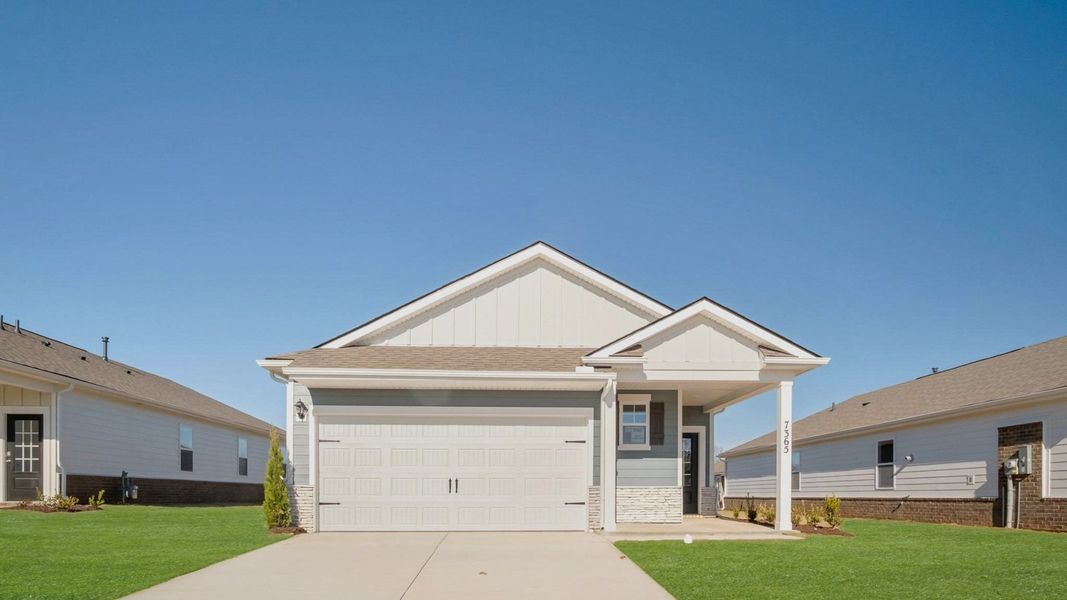 Front exterior of a new home in Legacy Farms, White House, TN, highlighting curb appeal (Image 1). Front exterior of a new home in Legacy Farms, White House, TN, highlighting curb appeal (Image 1).