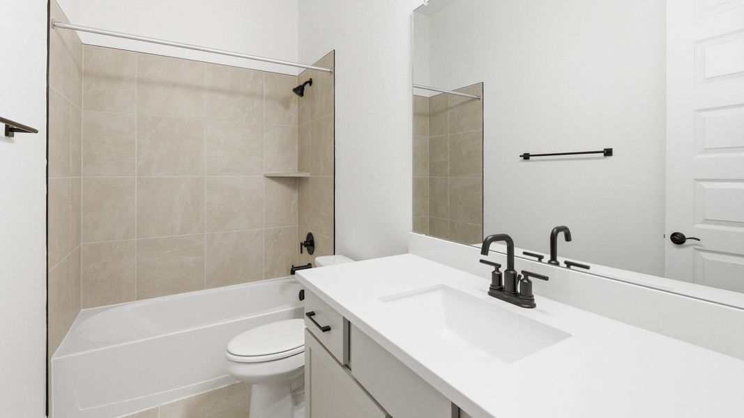 Furnished interior view inside a new home in Oaks at San Gabriel, Georgetown (Image 17).