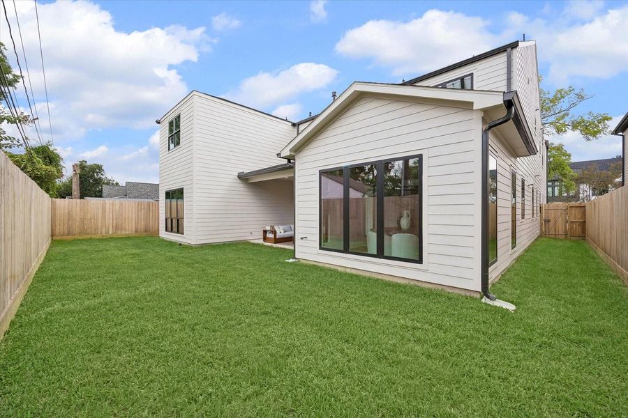 Exterior details and patio area of a home in , Houston (Image 3). Exterior details and patio area of a home in , Houston (Image 3).
