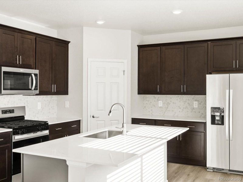 Furnished interior view inside a new home in Poudre Heights: The Lakes Collection, Windsor (Image 8).
