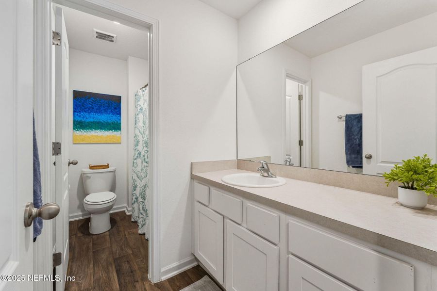 Furnished interior view inside a new home in Ravenswood Village, St. Augustine (Image 9).