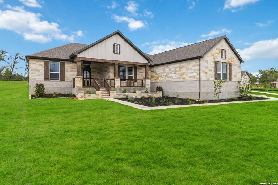 Front exterior of a new home in Jordan's Ranch, San Antonio, TX, highlighting curb appeal (Image 20).
