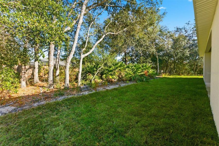 Exterior details and patio area of a home in , Citrus Springs (Image 38).