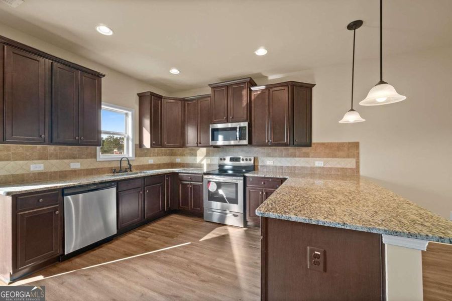 Furnished interior view inside a new home in Garden Walk, Jackson (Image 4).