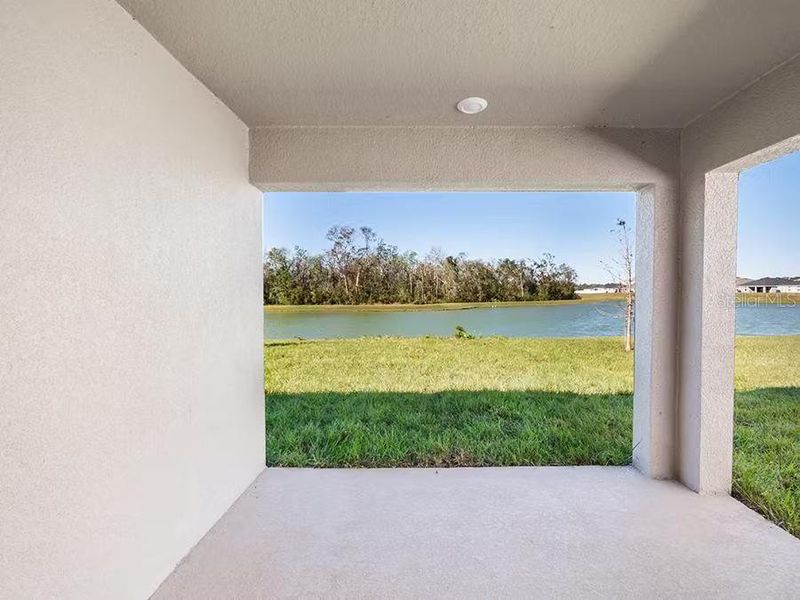 Exterior details and patio area of a home in Stonebridge North, Zephyrhills (Image 2).