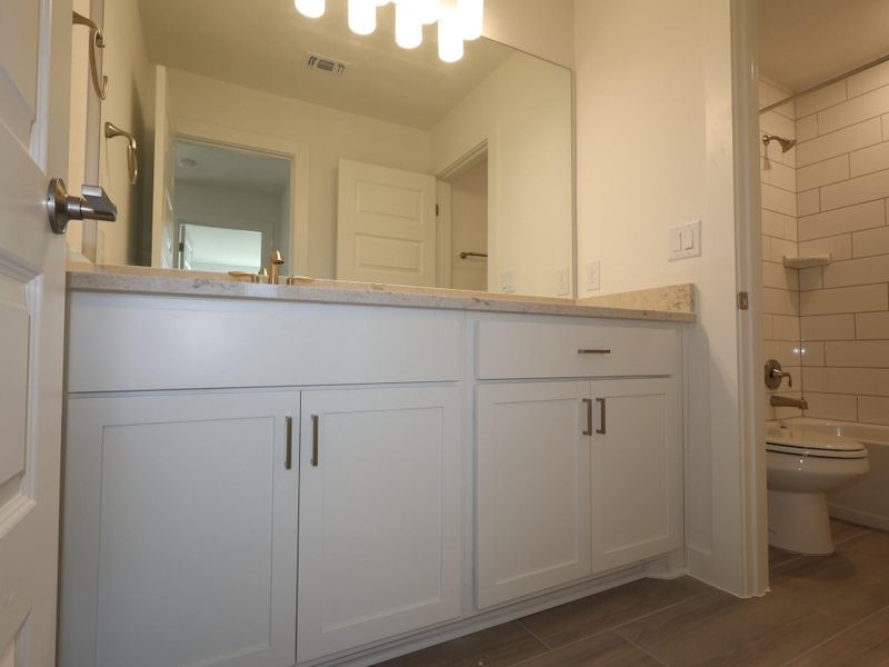 Furnished interior view inside a new home in Edgewood, Leander (Image 13). Furnished interior view inside a new home in Edgewood, Leander (Image 13).