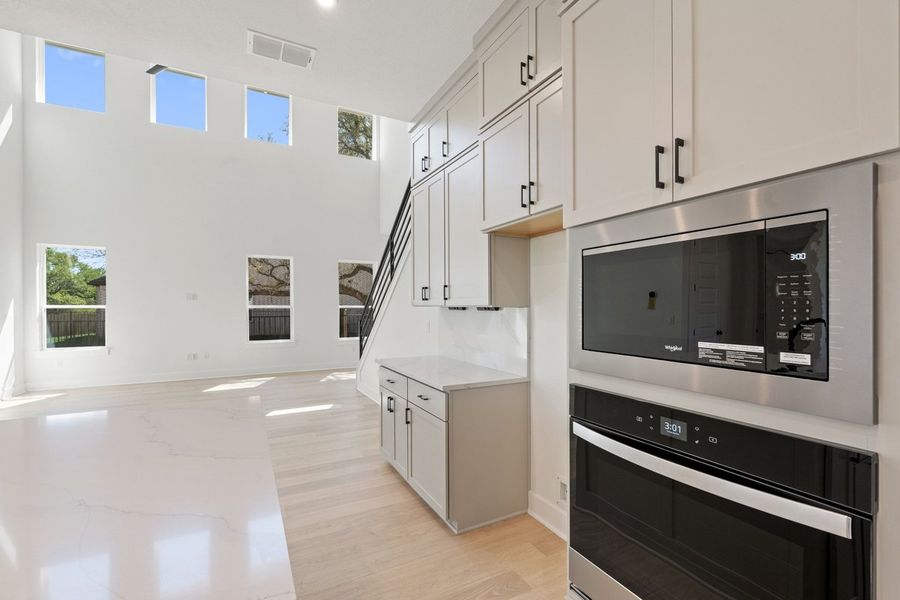 Furnished interior view inside a new home in Persimmon, Buda (Image 4).
