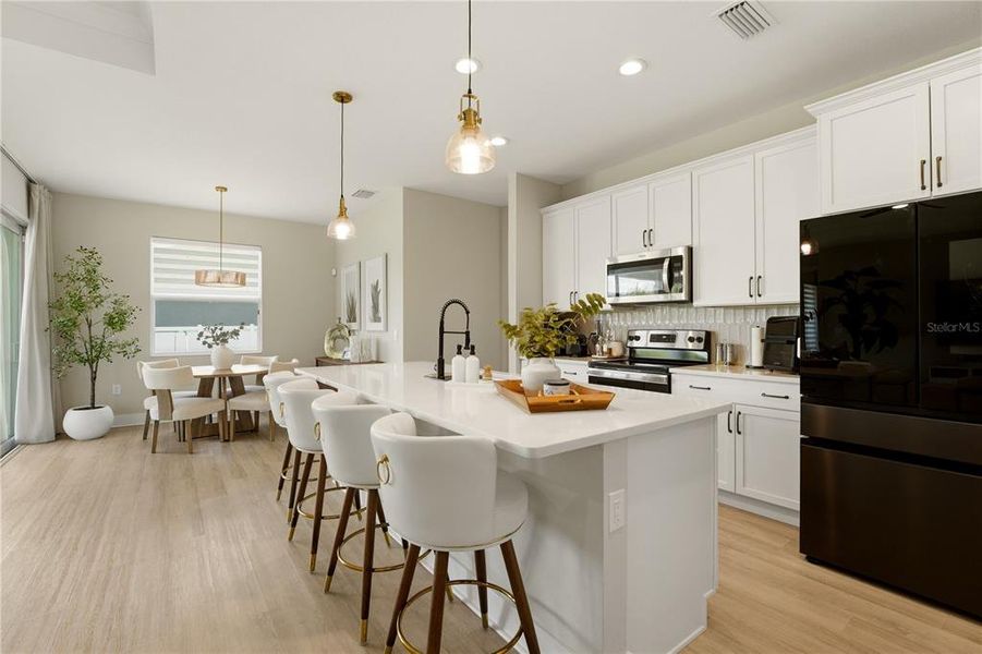 Furnished interior view inside a new home in , Port Charlotte (Image 14). Furnished interior view inside a new home in , Port Charlotte (Image 14).