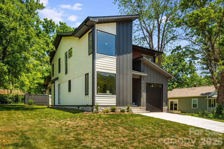 Front exterior of a new home in , Black Mountain, NC, highlighting curb appeal (Image 2). Front exterior of a new home in , Black Mountain, NC, highlighting curb appeal (Image 2).