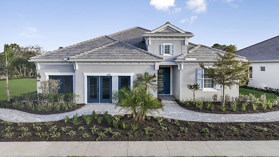 Front exterior of a new home in Avelina, Venice, FL, highlighting curb appeal (Image 22).