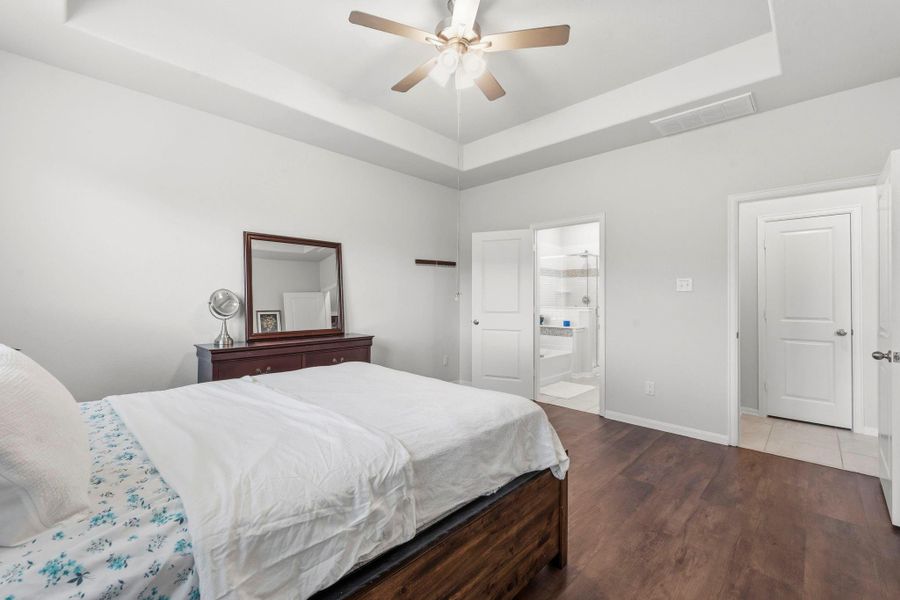 Spacious and serene, this primary suite offers the perfect balance of comfort and style. Spacious and serene, this primary suite offers the perfect balance of comfort and style.