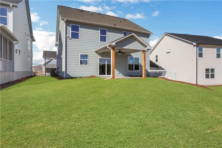 Exterior details and patio area of a home in Twin Lakes, Hoschton (Image 27).