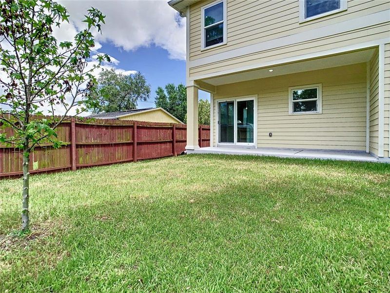 Front exterior of a new home in , Tampa, FL, highlighting curb appeal (Image 25).