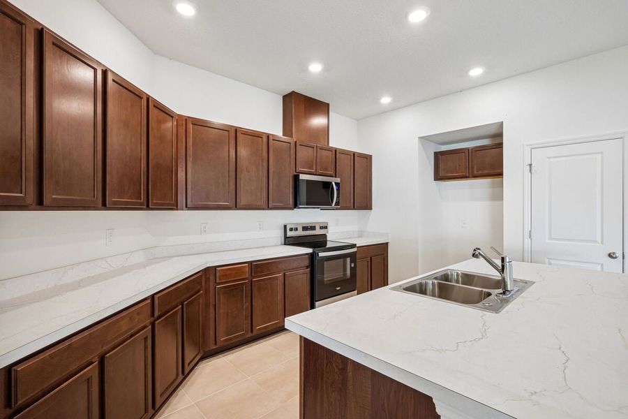 Furnished interior view inside a new home in The Preserve at Legends Pointe II, Hudson (Image 4).