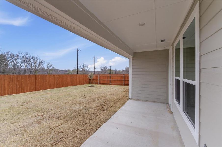 Exterior details and patio area of a home in Covenant Park, Springtown (Image 17).