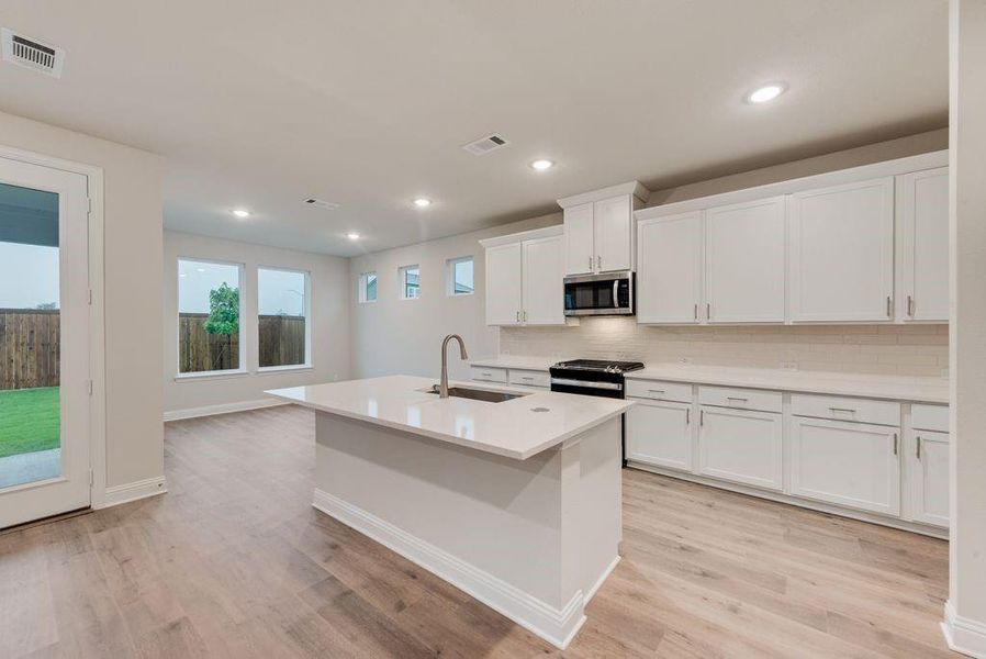 Furnished interior view inside a new home in Creekside of Crowley, Crowley (Image 6).