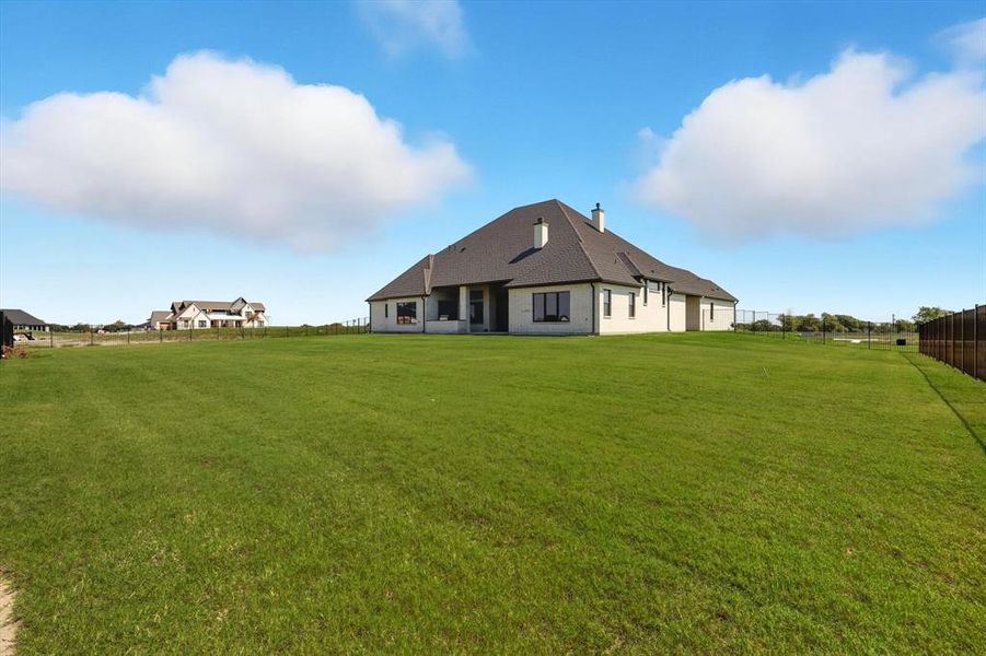 Front exterior of a new home in , Celina, TX, highlighting curb appeal (Image 23). Front exterior of a new home in , Celina, TX, highlighting curb appeal (Image 23).
