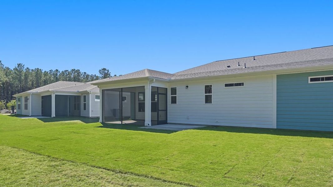 Exterior details and patio area of a home in Sun City Hilton Head, Bluffton (Image 26).