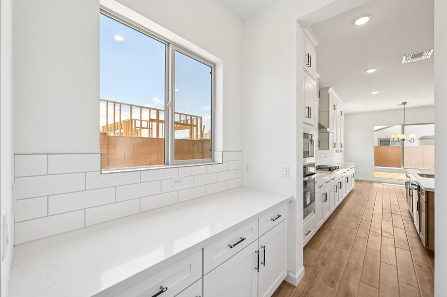 Optional Butler's pantry pass through. Finishes and options may vary Optional Butler's pantry pass through. Finishes and options may vary