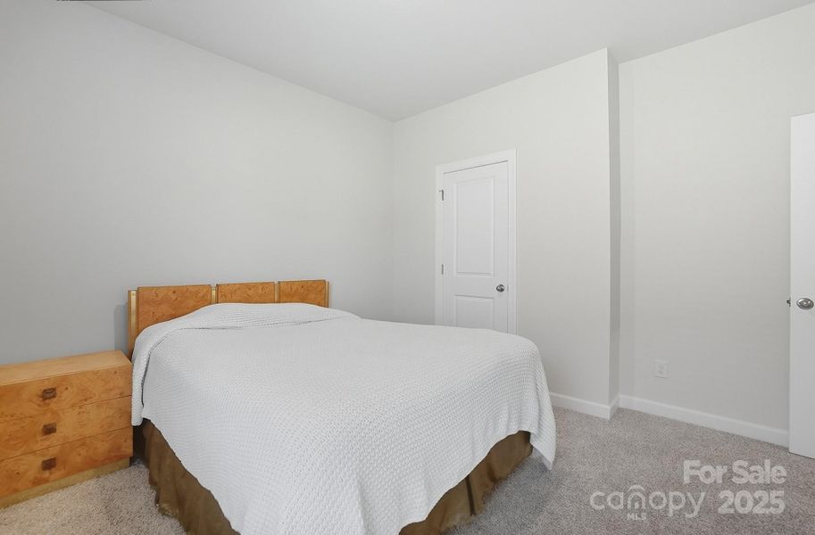 Furnished interior view inside a new home in Solena at the Vineyards II, Charlotte (Image 17). Furnished interior view inside a new home in Solena at the Vineyards II, Charlotte (Image 17).