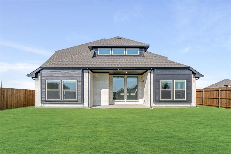 Front exterior of a new home in Wildflower Ranch 60-65, Fort Worth, TX, highlighting curb appeal (Image 22). Front exterior of a new home in Wildflower Ranch 60-65, Fort Worth, TX, highlighting curb appeal (Image 22).