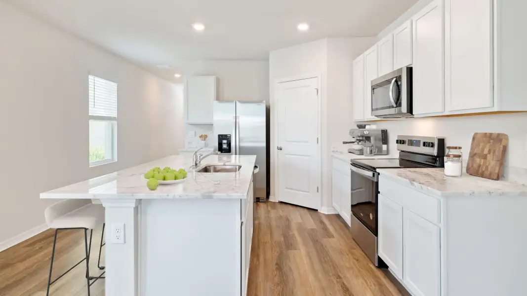 Furnished interior view inside a new home in Pinellas County Spot Lots, St. Petersburg (Image 4).